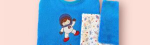 Lot naissance personnalisé – Bavoir “Astronaute” + lingettes